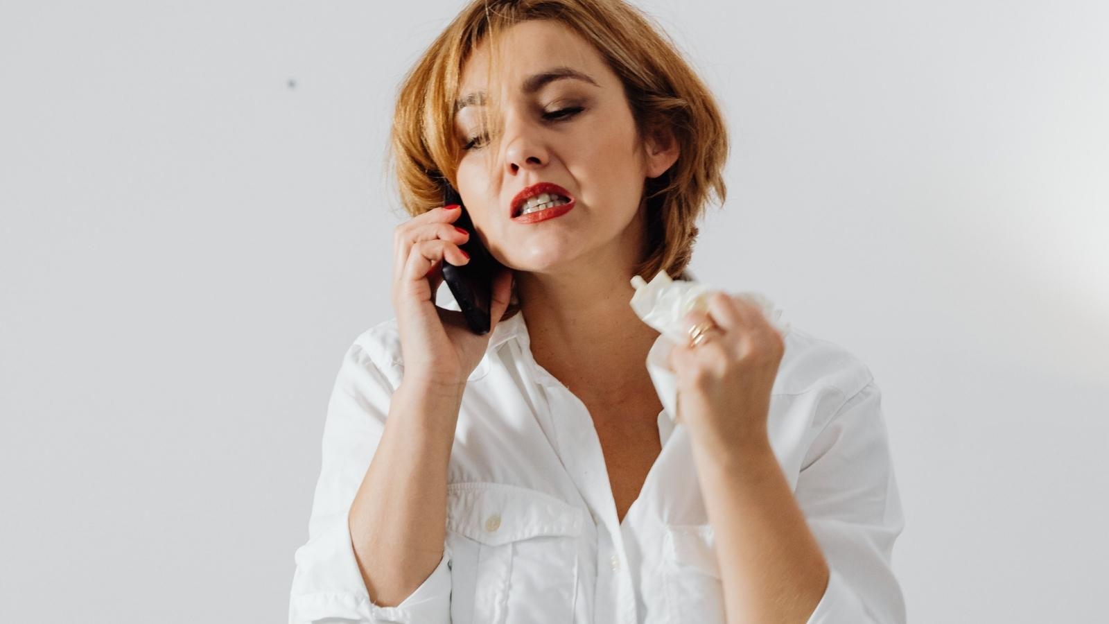 $13/Hour Employee Considers Quitting After Toxic Boss Expects 24/7 Availability on Off Days stressed woman talking on phone