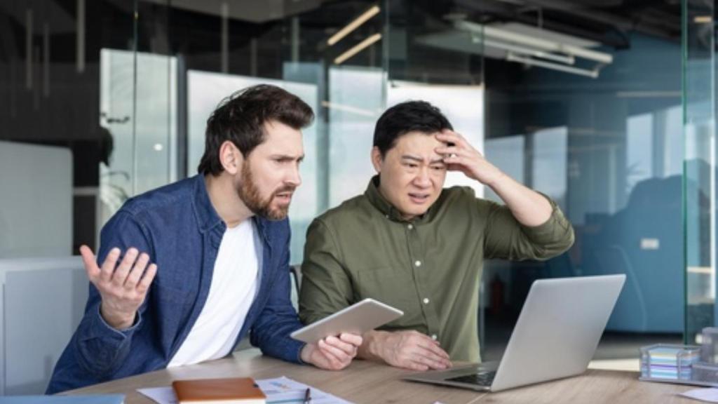 Two confused tech workers