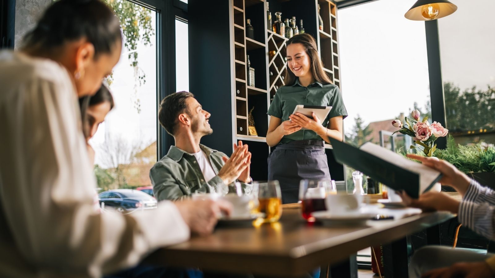 waitress working a table