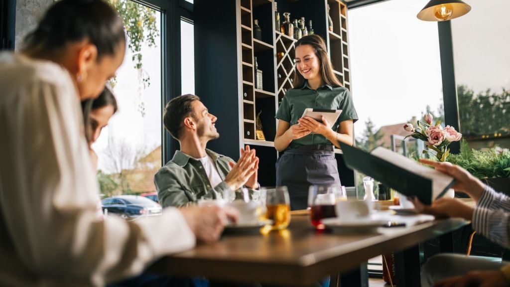 waitress working a table