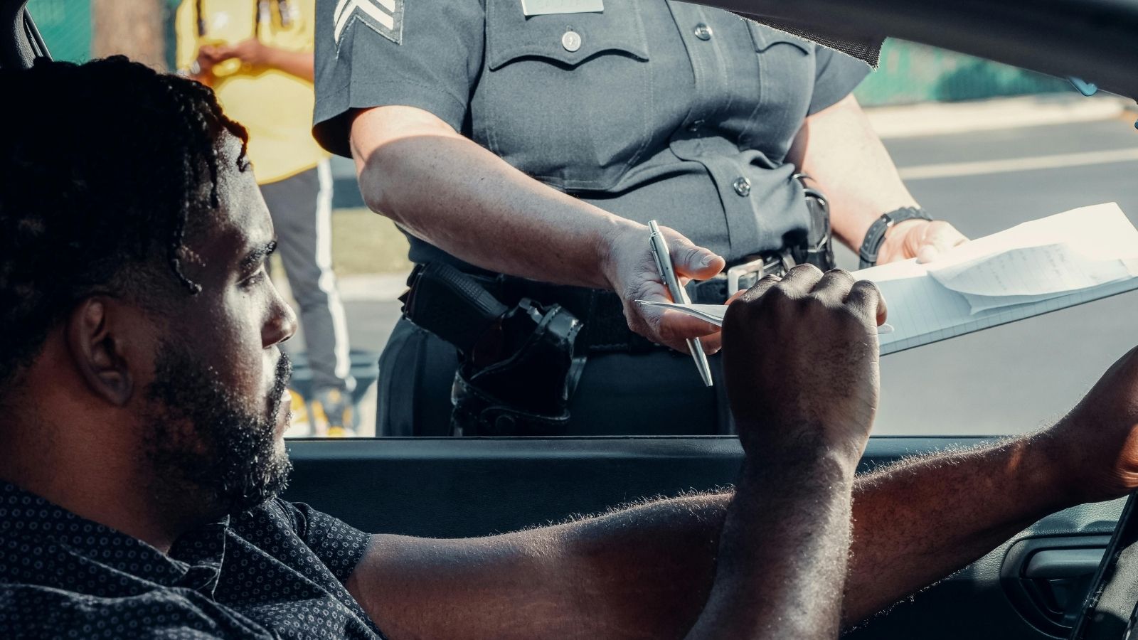 man getting a ticket