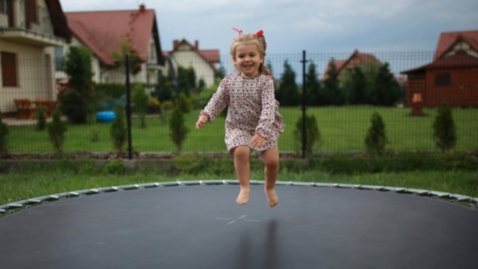 Kid on trampoline