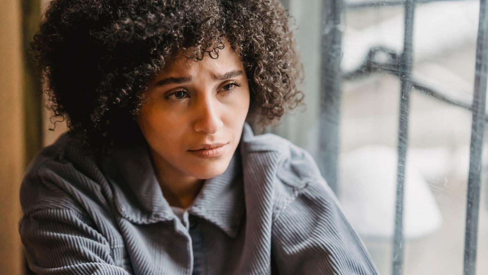 She Finally Got Her Own Place. 19 Days Later, Her Irresponsible Sibling Asked Her to Take Over as Parent. upset woman looking pensive