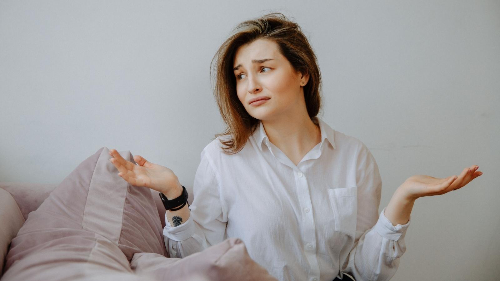 upset woman shrugging
