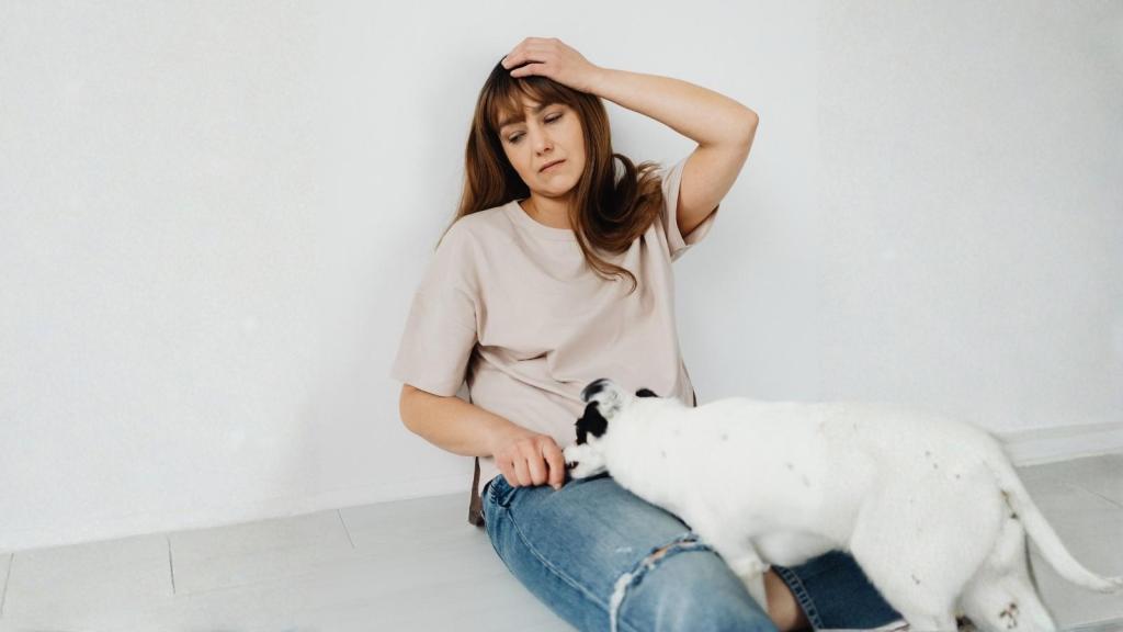 upset woman sitting with her dog