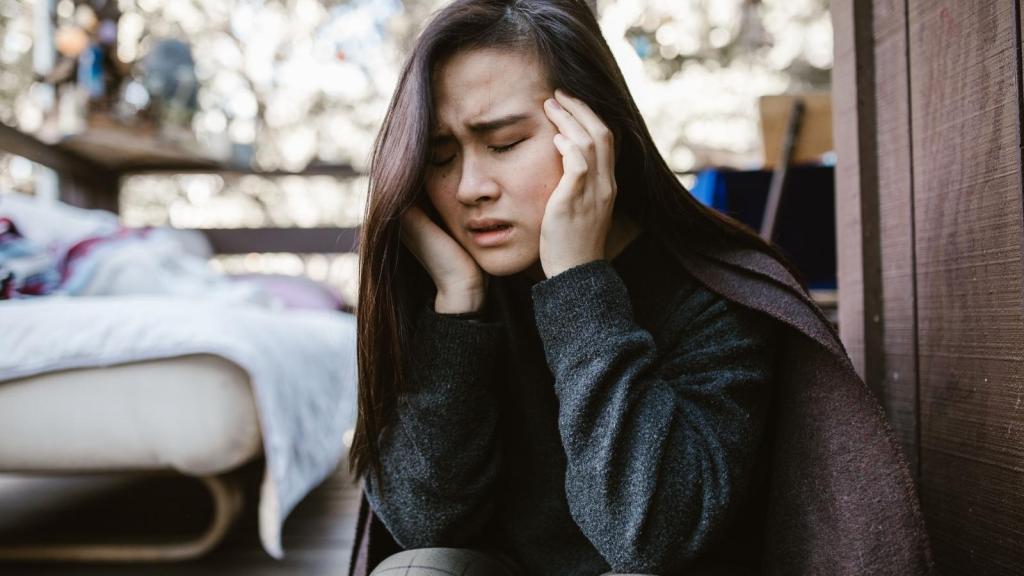 upset young woman looking troubled
