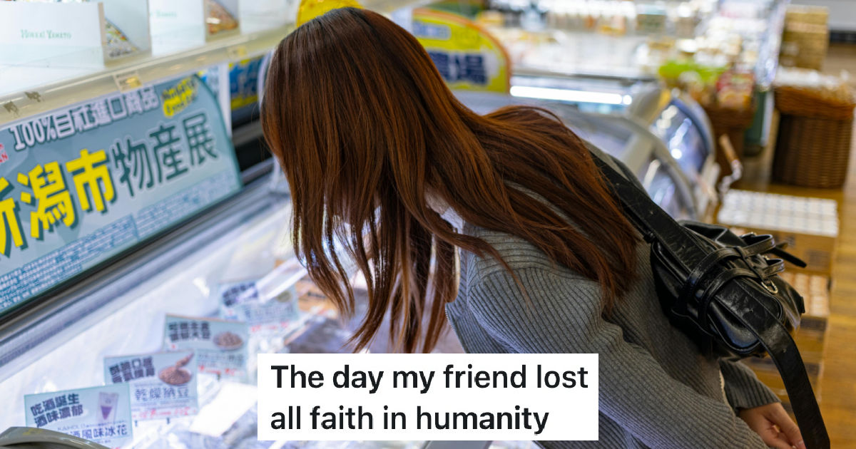 woman looking into a display case