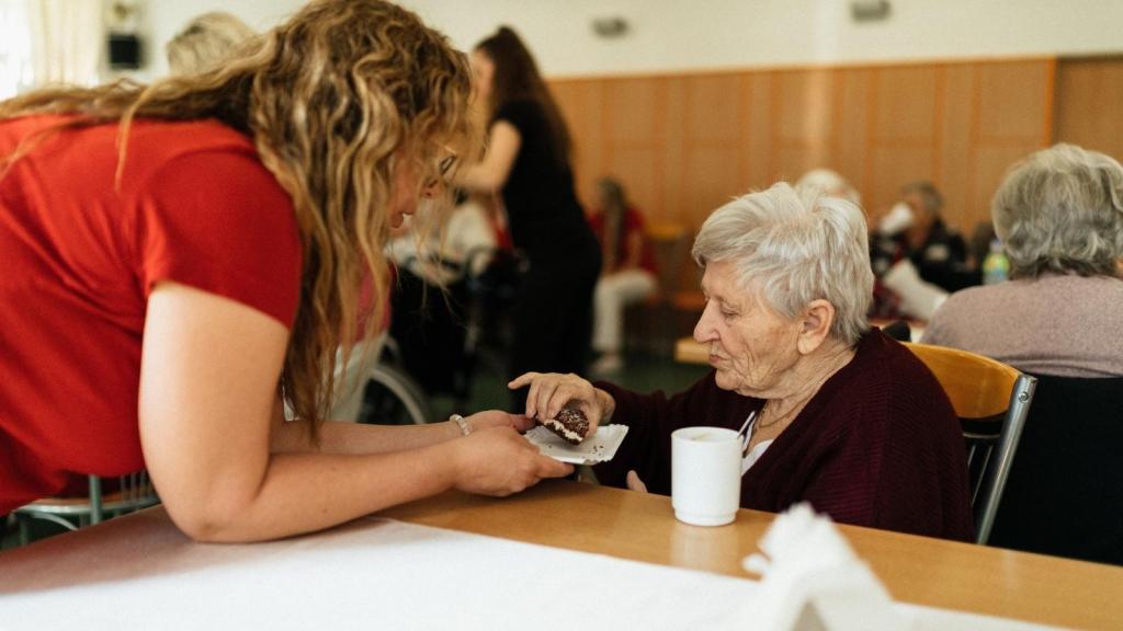 woman caring for her aging mother