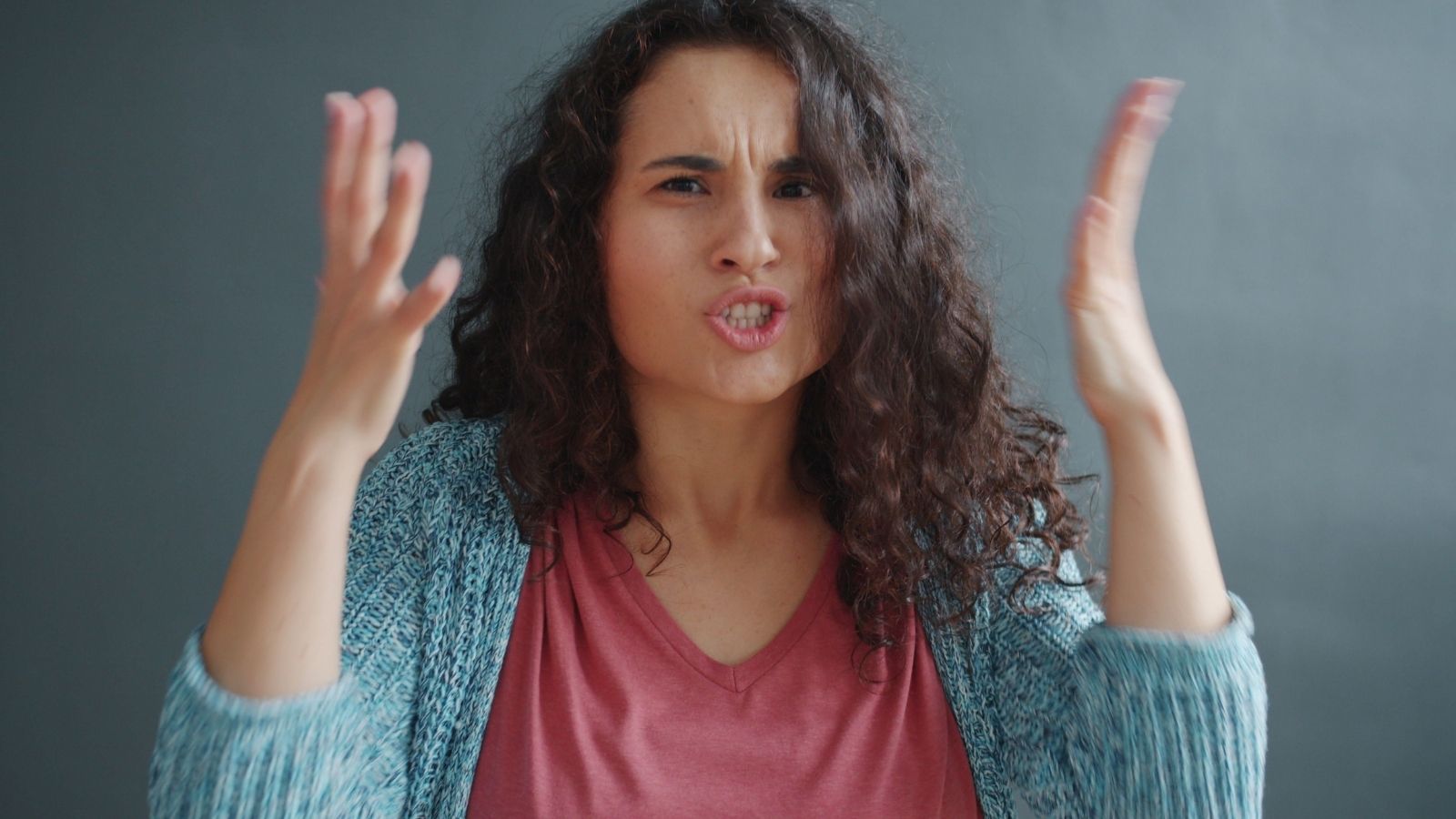Angry woman yelling at someone