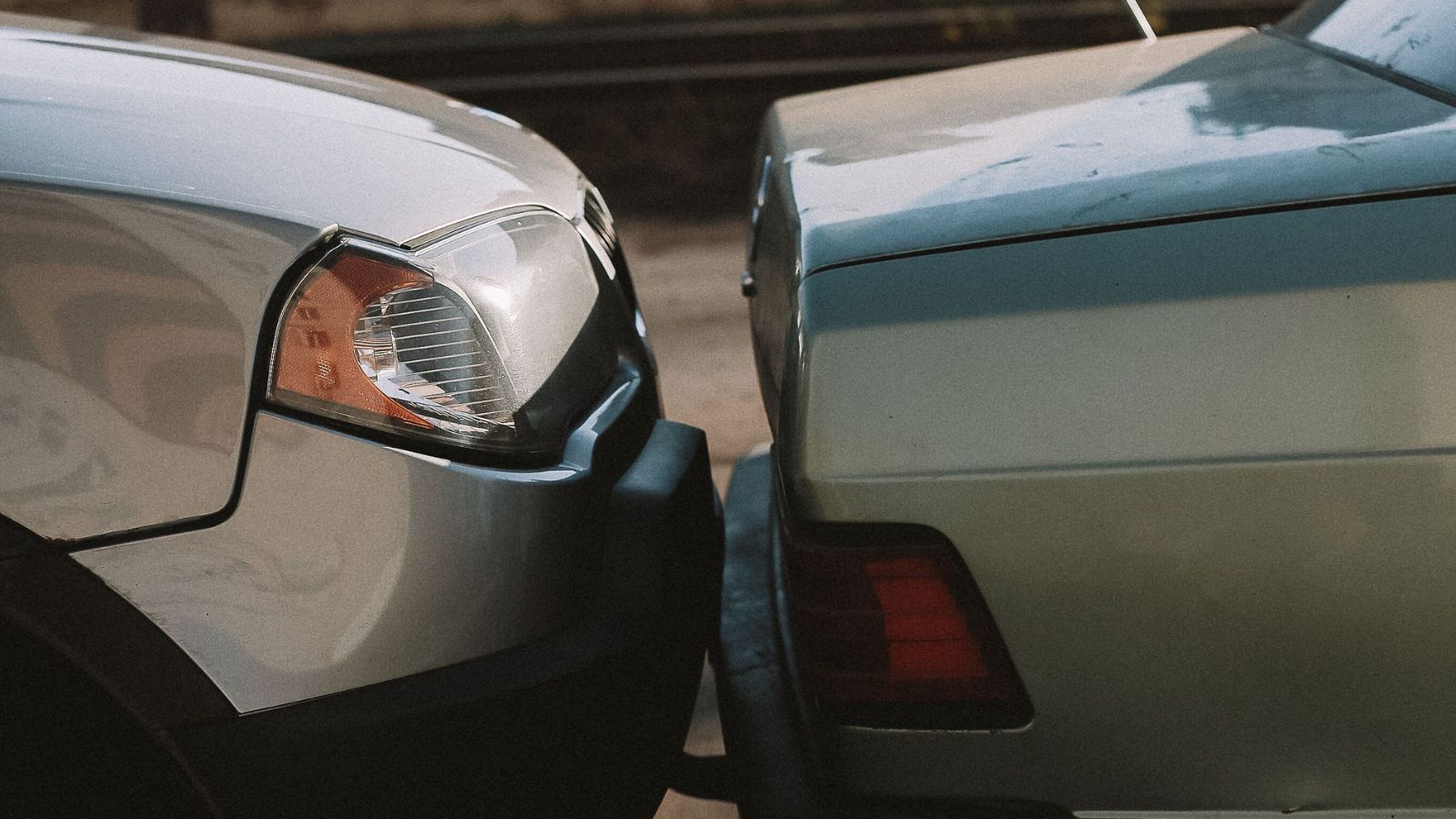 She Was Legally Parking on the Public Street—So Why Did Her Neighbors Keep Getting More Hostile? A car's front bumper hitting the rear end of another vehicle