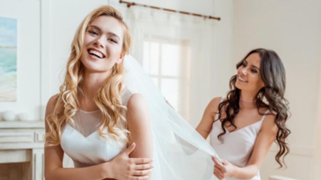 Bride and bridesmaid