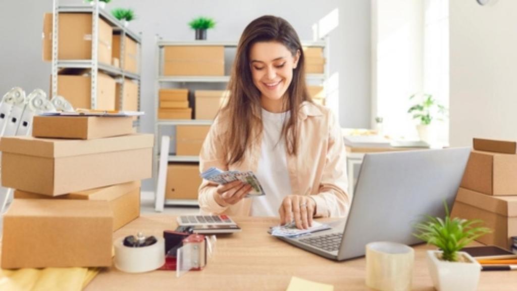 Woman in cash office
