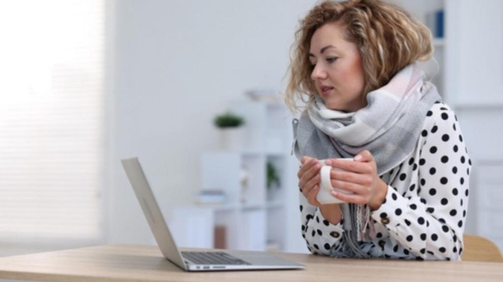 Woman in cold office