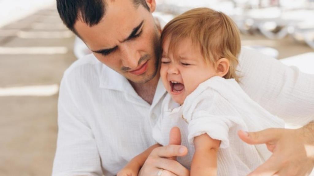 Father with crying son