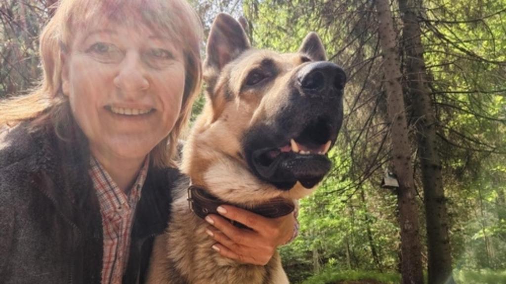 Woman with German shepherd