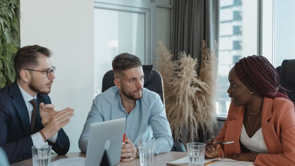 Employees having a serious meeting in the office