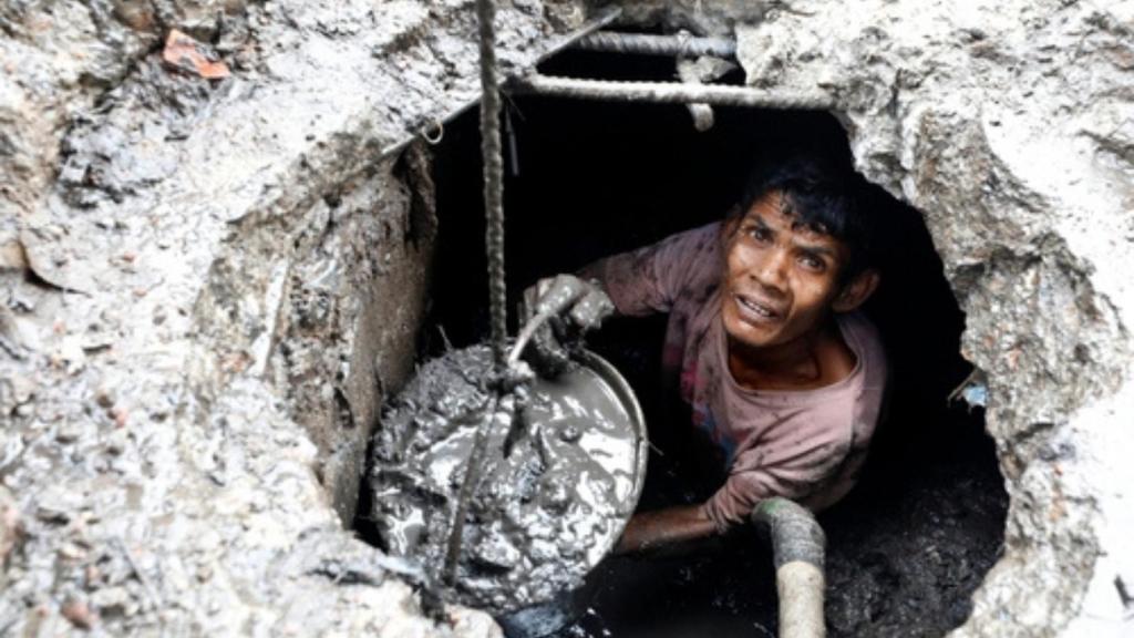 Man working on sewers