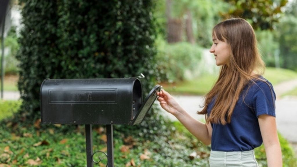 Woman checking her mail