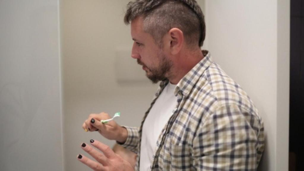 Man with painted nails