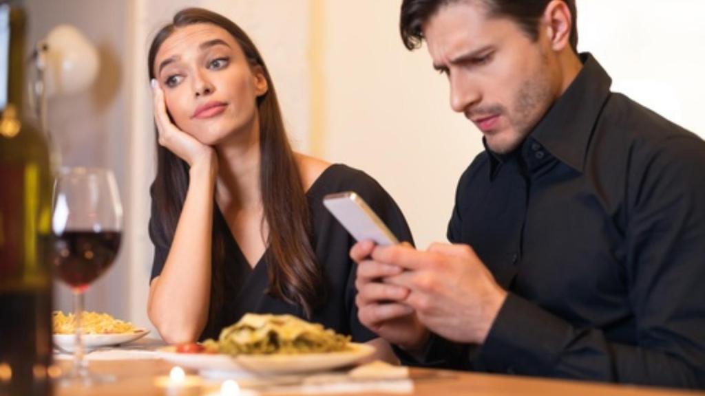 Annoyed woman, man on phone