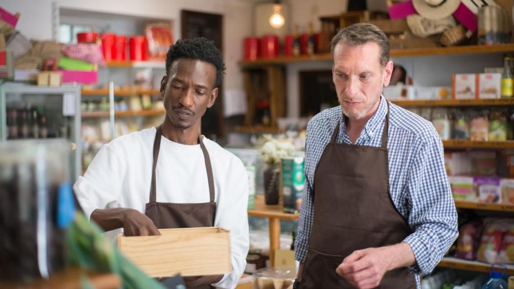 Two men working on a grocery store project