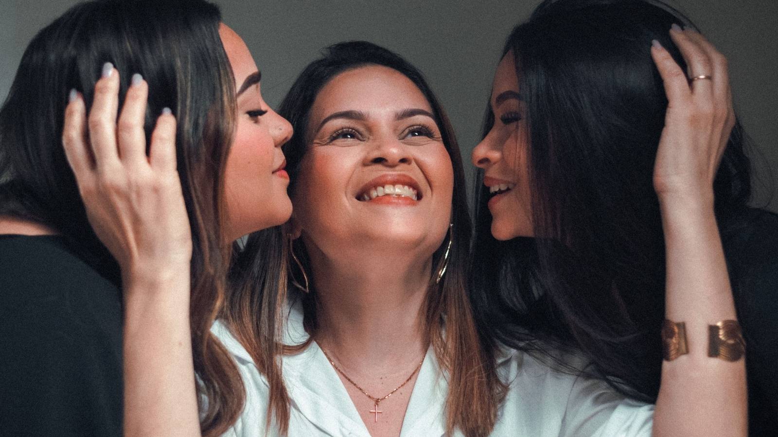 Woman Plans Sisters Only Dinner Before Moving Away, but Her Sister Wants to Bring Her Boyfriend Woman with her two sisters