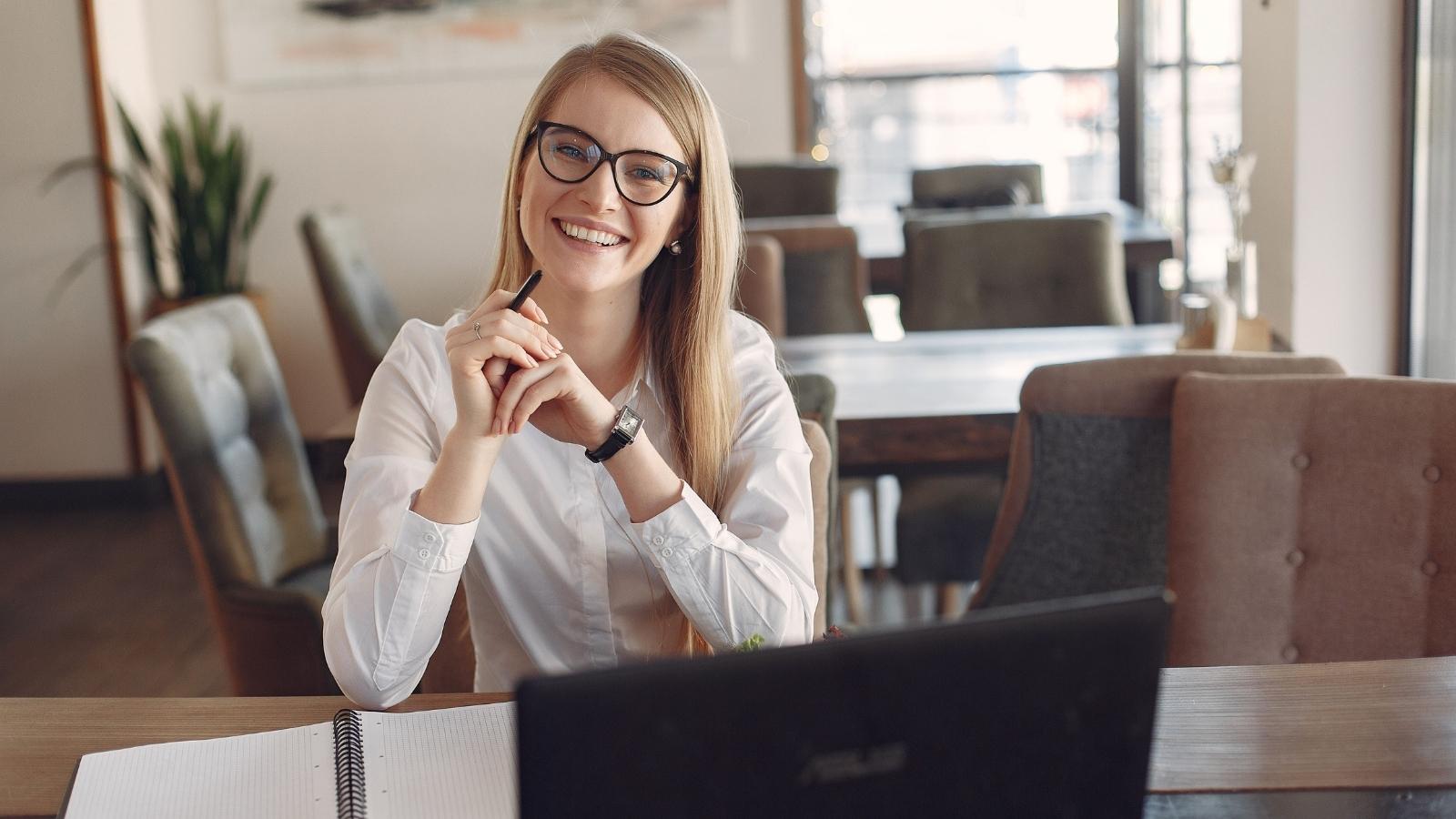 Manager Sent Her Home Early to Keep Hours Fair—Then Her Close Friend Caused a Scene Restaurant manager smiling at a table