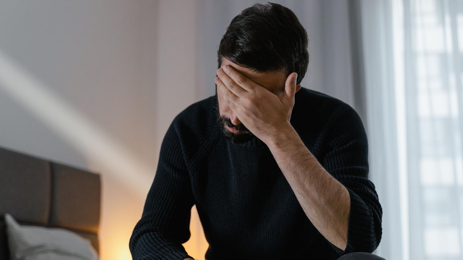 Man stressed out because of kids at the hotel