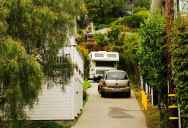 A Homeowner Was Already Fed Up With His Neighbor’s Property — Then Their Adult Son Moved Into A Camper In The Driveway