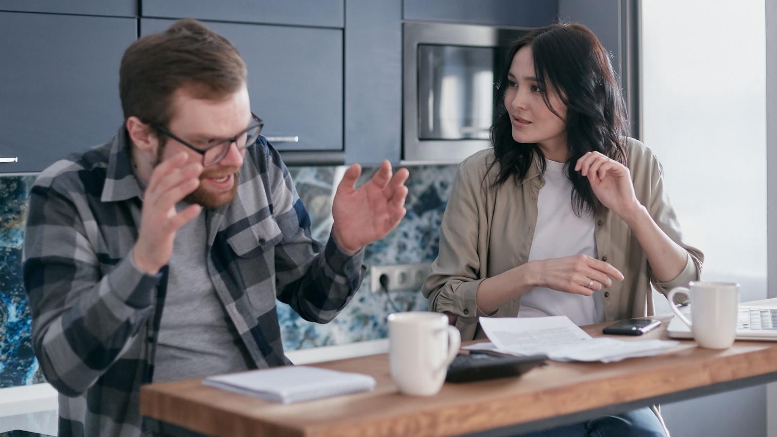 Man and woman disagreeing about a chore