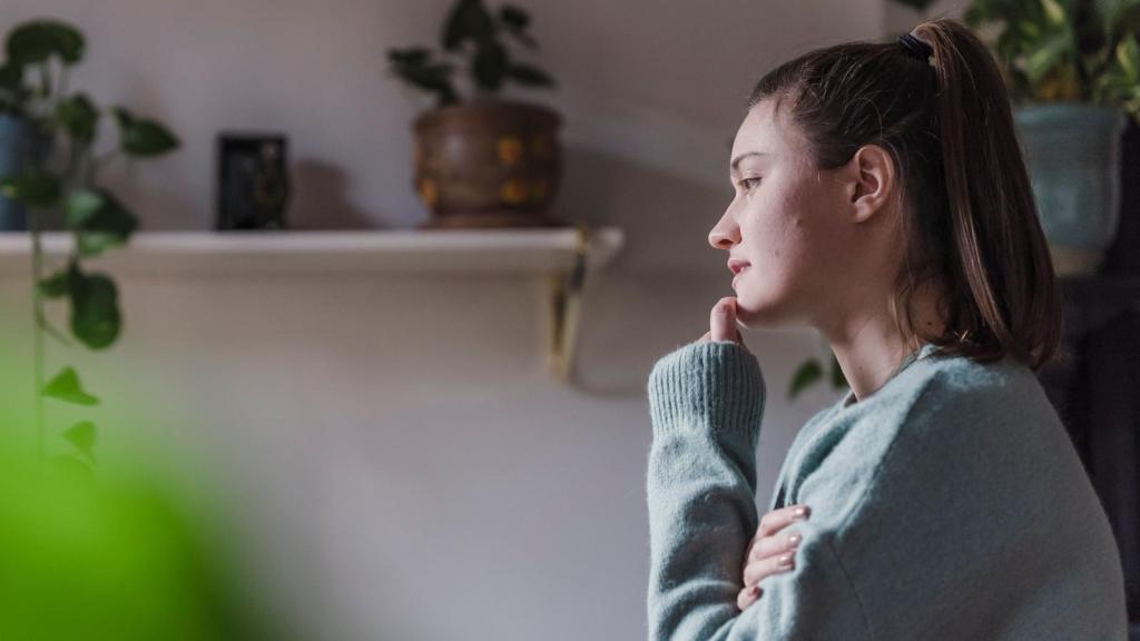 Woman thinking about her in-laws house