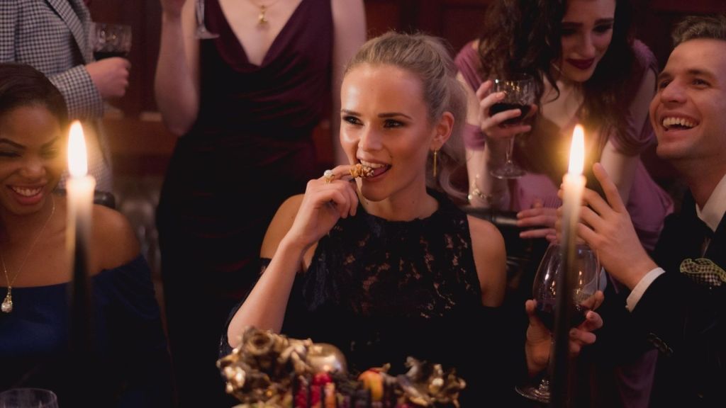Woman sitting at dinner with her family
