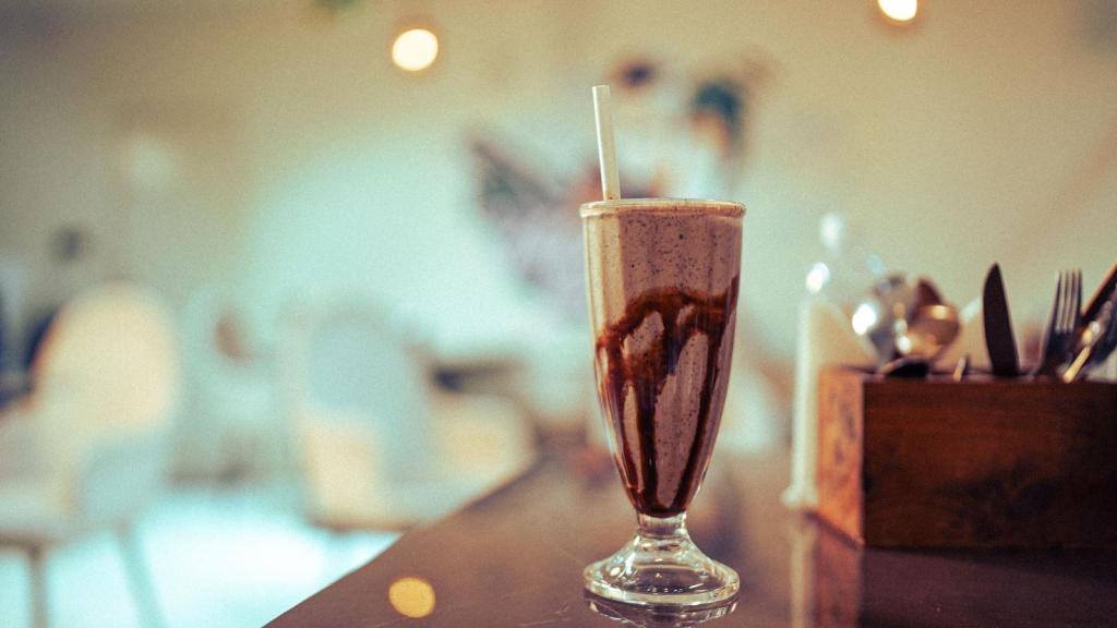 Glass of chocolate milk on the counter