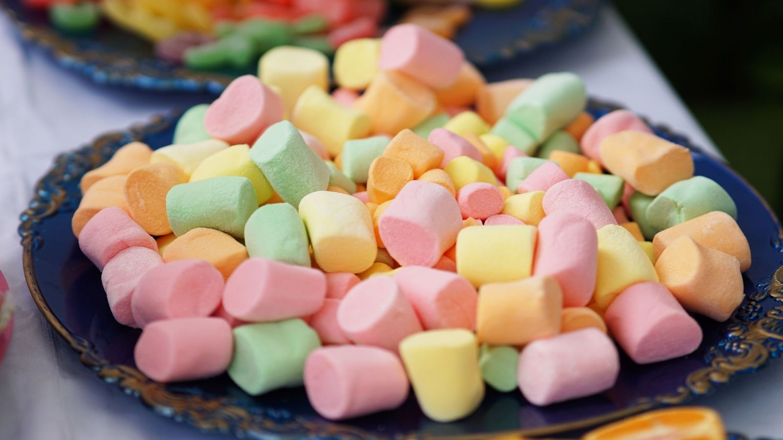 She Made Confetti Squares For Her Familys Thanksgiving, But Her Stepdad Took The Rest To Work Without Asking — Then Called Her Selfish For Being Upset Plate of rainbow marshmallows to use in confetti squares
