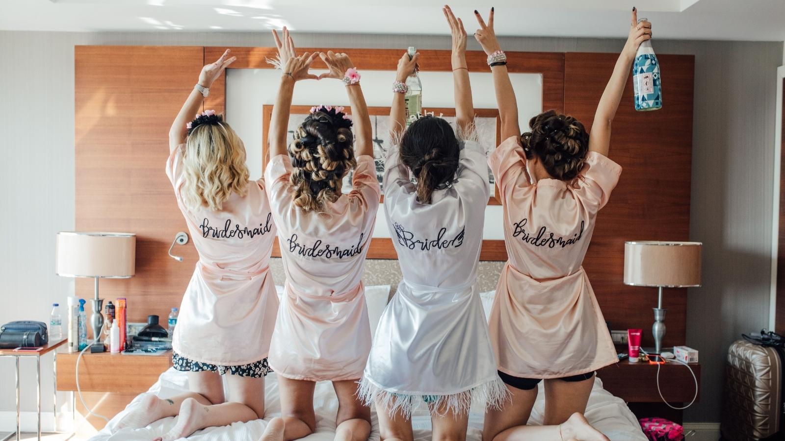 Bride and her bridesmaids in matching pajamas