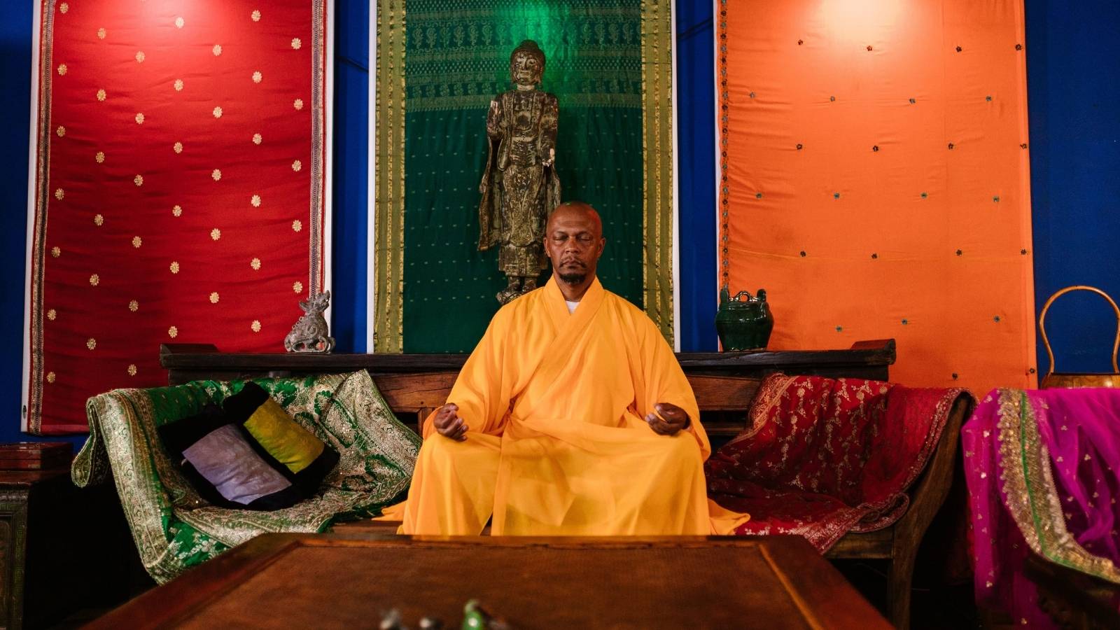 He Stepped Out to Blow His Nose During a Buddhist Chant — Now He Thinks He Offended His Host Man dressed in traditional Buddhist robes