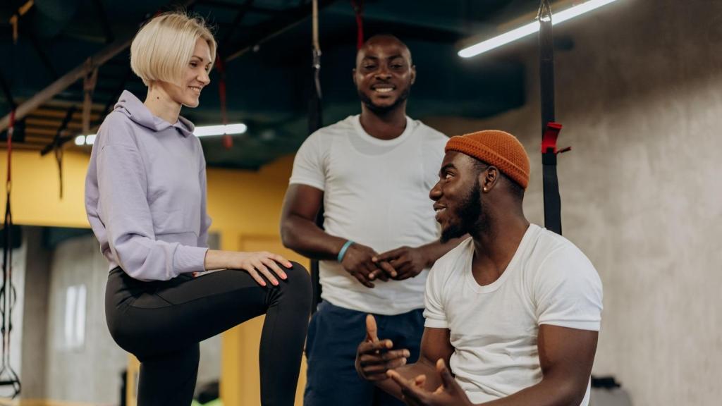 Coworkers talking at a gym