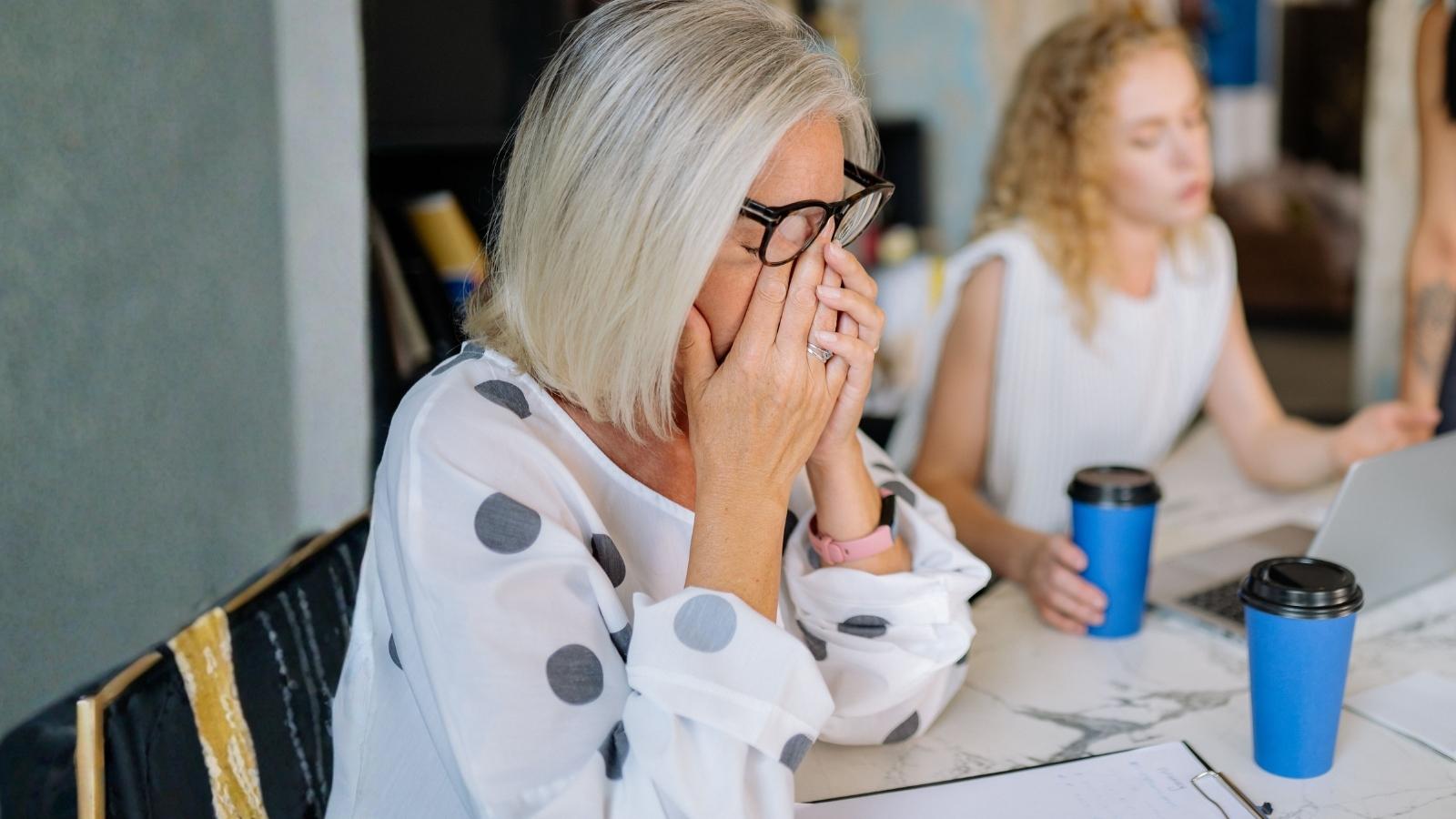 Enjoy the Chair: Newly Promoted Supervisor Delivers Ultimate Payback Over an Unlabeled Hemorrhoid Cushion embarrassed woman at work