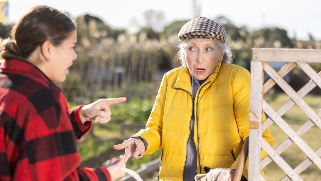 woman confronting her older neighbor