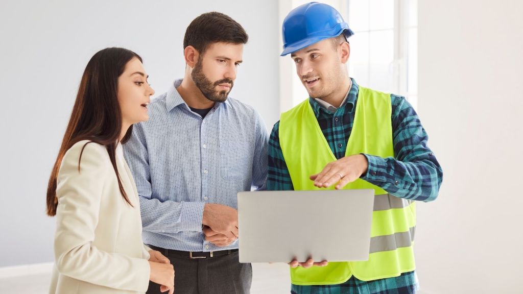 couple talking to contractor
