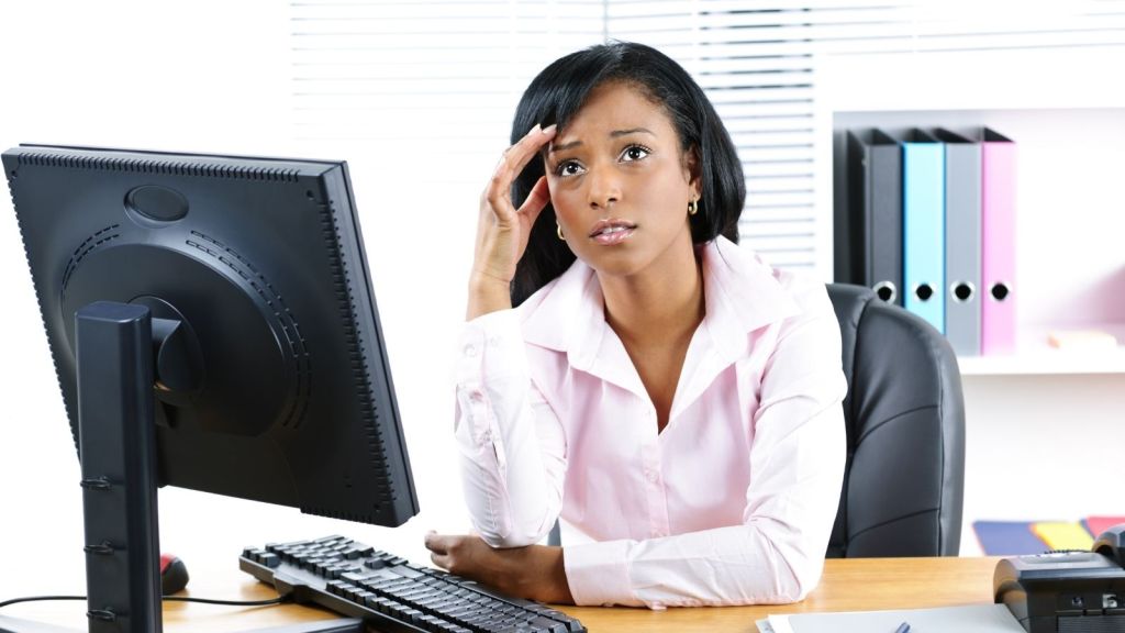 frustrated young woman in an office