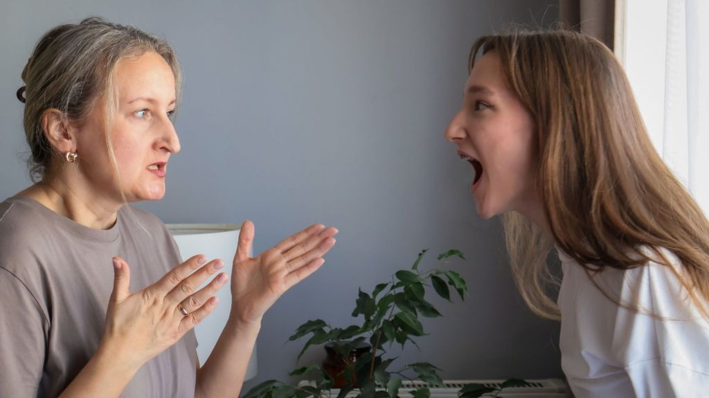 teenage girl yelling at her mom