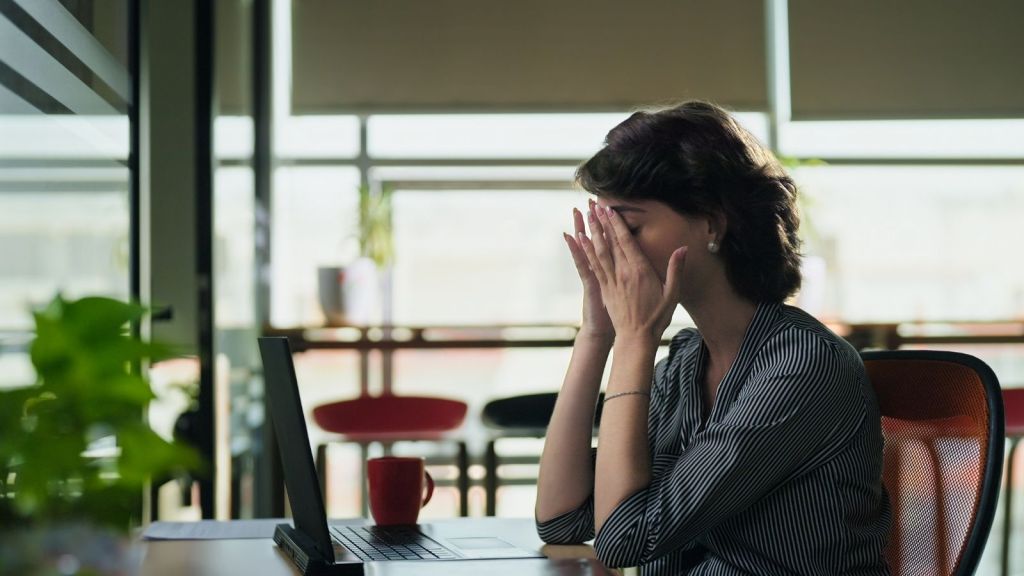 upset woman in an office