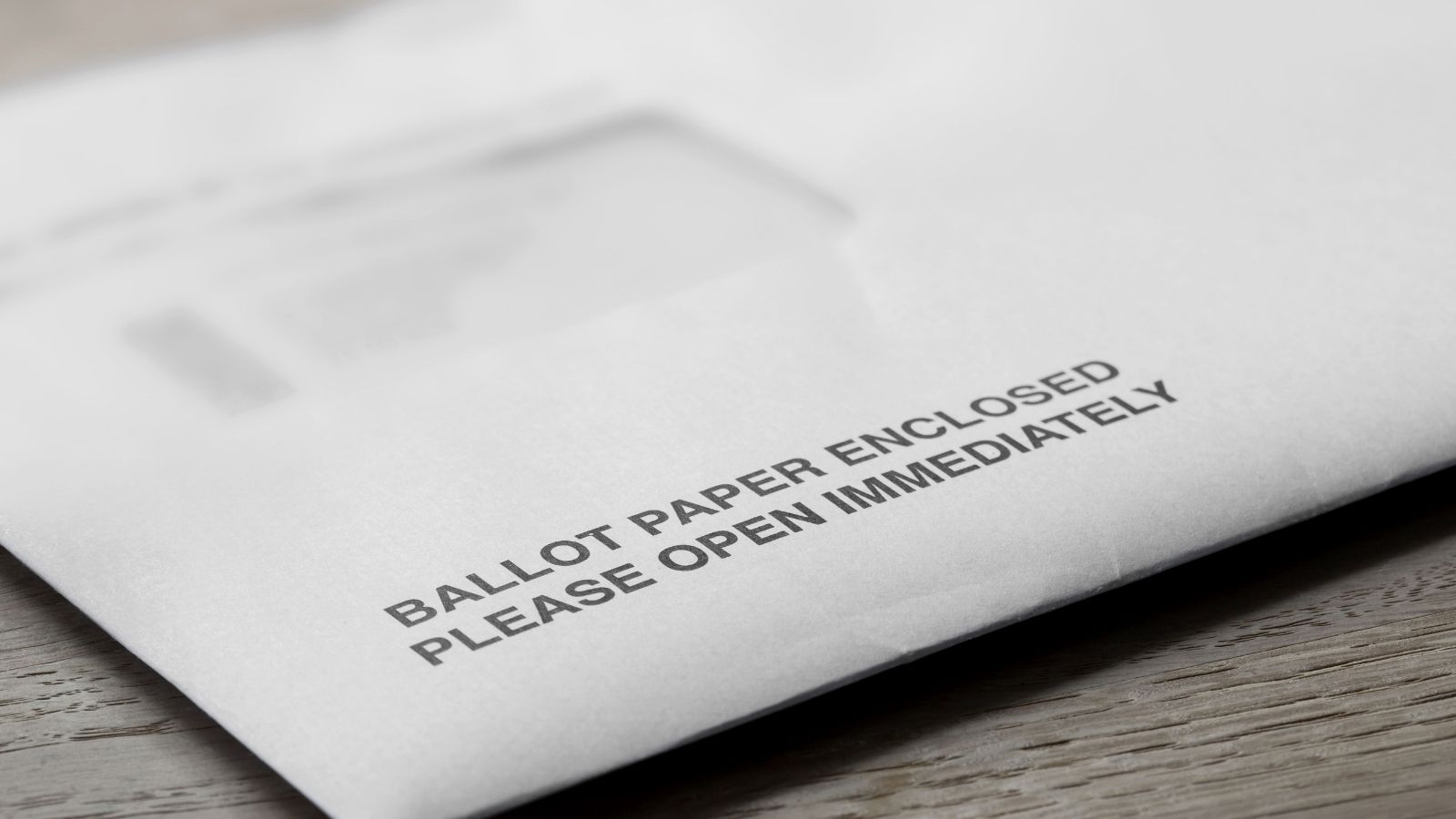 Her Landlord Used the Rental Address for Mail—Then Accused Her of Withholding Mail When She Refused to Act as an On Demand Courier envelope with the words "ballot paper enclosed please open immediately"