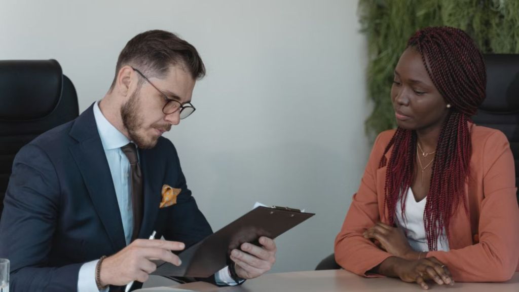 Woman being interviewed by HR in the office
