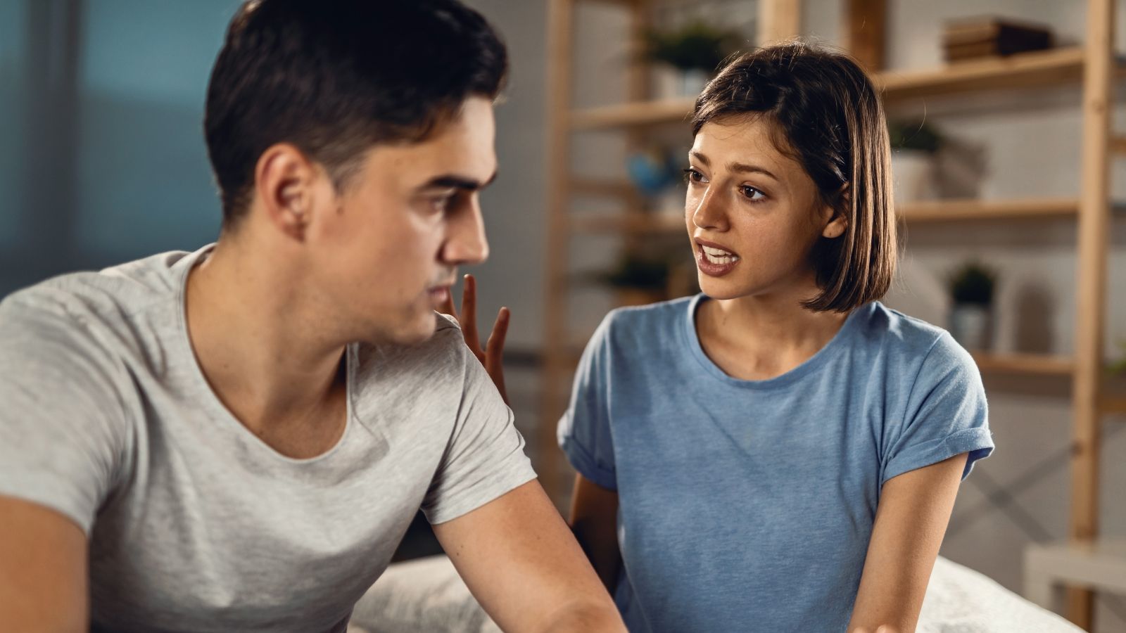 Man and woman arguing at home