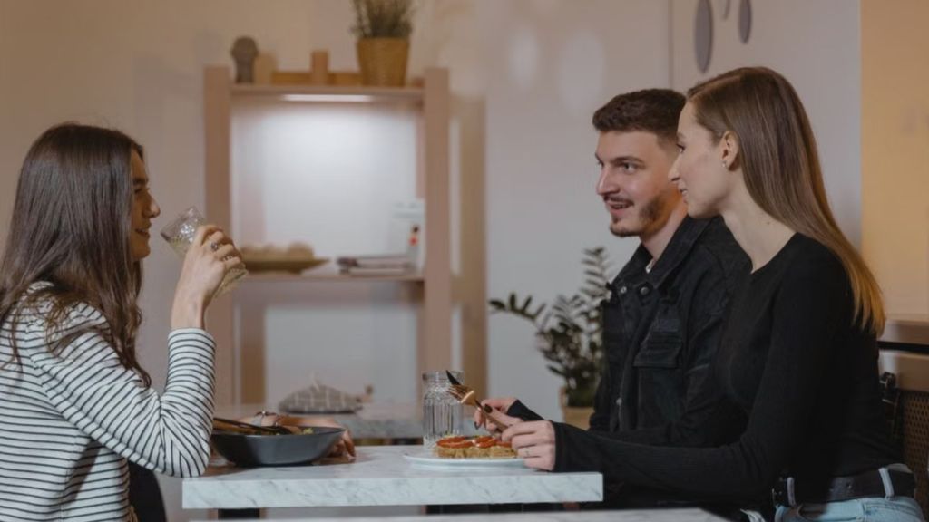 Friends enjoying a meal and conversation together