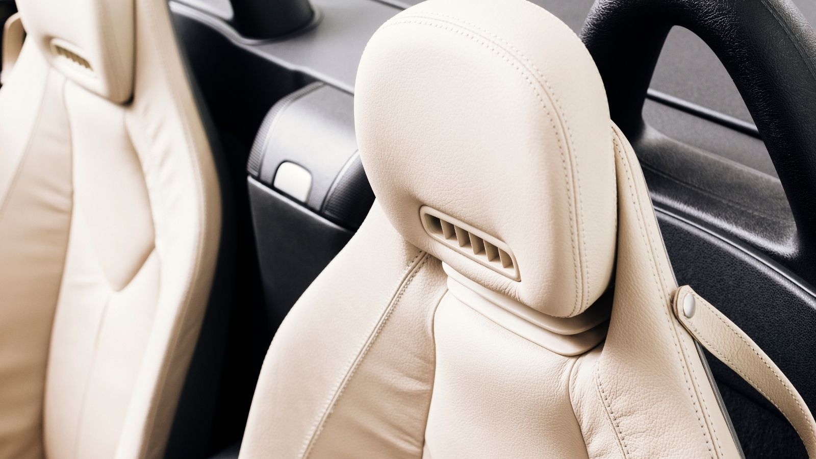 His Wife Insisted on Buying a Car With White Seats—Now She Refuses to Clean the Toddler Stains She Guaranteed Wouldnt Happen White car interior in leather material