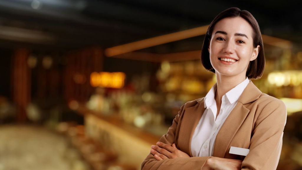 hostess at a restaurant smiling