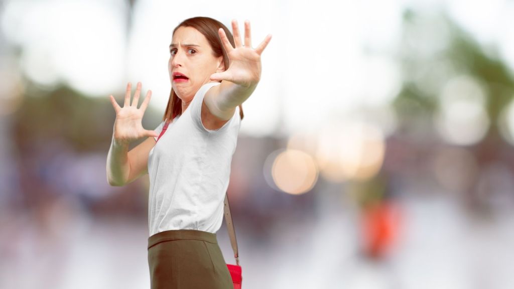 woman looking afraid